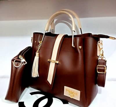 women hand bag with tassel