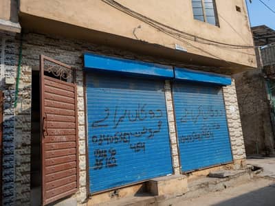 2 shops+House for Sale in commercial location in front of a school