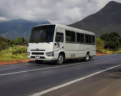 VAN,BUS,,HIACE,COASTER TOYOTA FOR RENT PICNIC AND PARTY