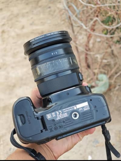 70dcanon 17.70 sigma lenz 03238636586