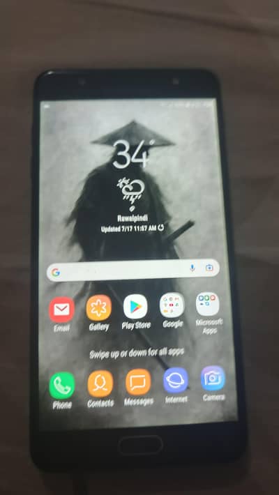 Samsung Mobile J7 Max with a cover free with it.