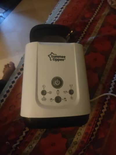Tommie tippee Fedder warmer