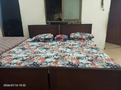 2 single beds without mattress