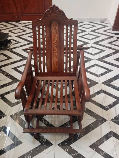 Wooden Rocking Chair used but is in good condition.