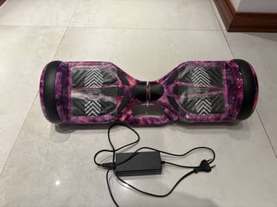 Hover board self balancing has bluetooth loud speakers slightly used