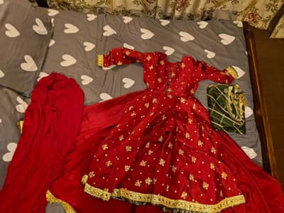 red penal frock with penal lehnga