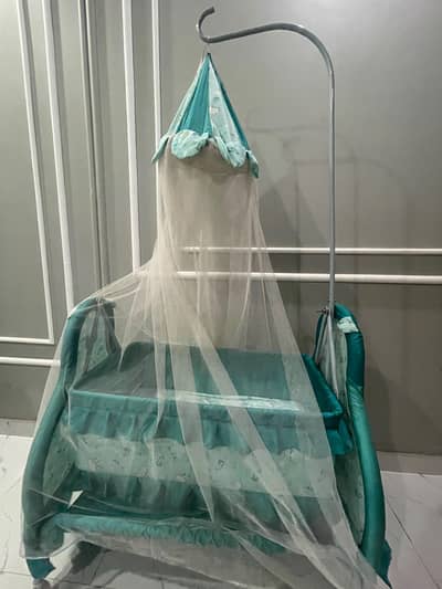 Kids swing cot with net.