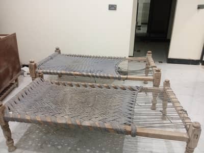 2 wooden charpai