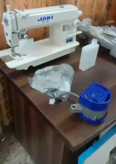 Jaki Full New Fresh packed Swing Machine + Stster+Motersitting Table