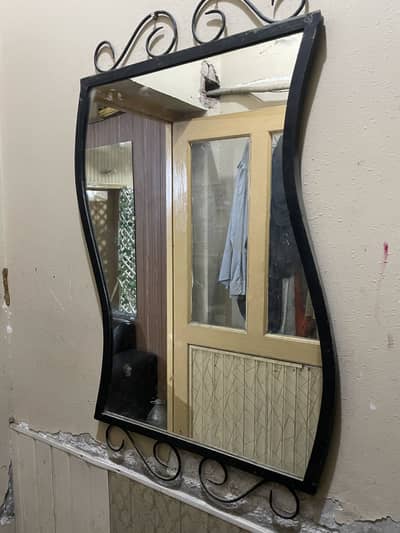 Rot iron mirror