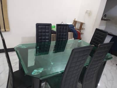 6 seater glass dining table . modern design