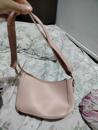 pink color hobo style bag