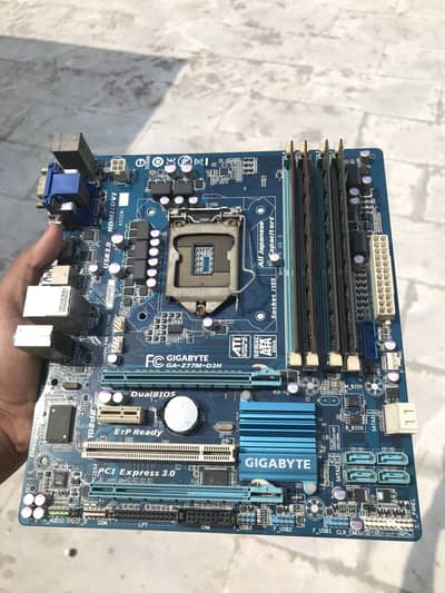 3rd gen gigabyte motherboard big size 4 Ram slots high speed.