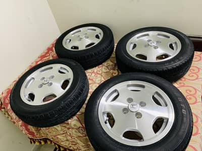 14 size enkei original rims with almost  new tyres