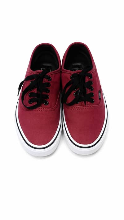 A2thrift. pk These are Vans Authentic sneakers in a burgundy or "Port