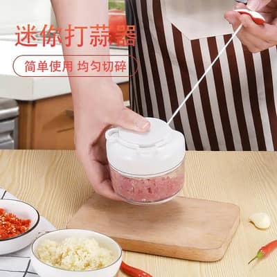 Mini garlic masher for fresh garlic puree