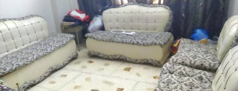 7 Seater sofa set mild condition