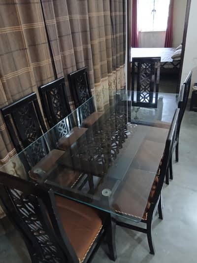 8 seater glass surface dining table for sale