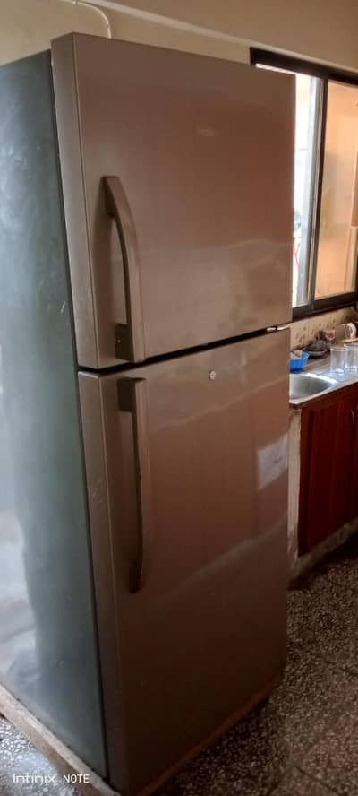 haier fridge big size slightly used . Refrigirator
