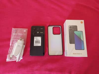 Xiaomi Redmi Note 13 with box charger  and all asessesories.