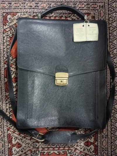 100 % original leather bag made in France brand new condition