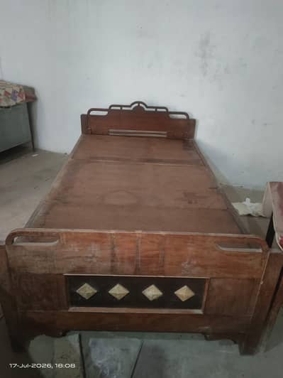 2 single wooden beds for sale