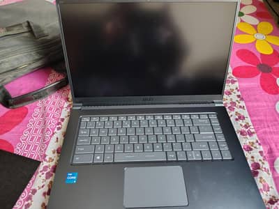 MSI modern 15 core i5 11 generation with 12 GB RAM with 512gb SSD