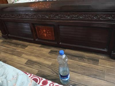 double bed with 2 side tables and dressing table