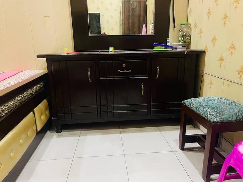 bed with a dressing table 1
