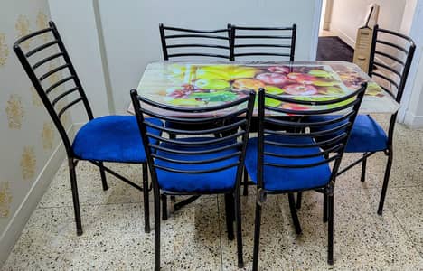 Rod iron dining table 6 chairs for sale