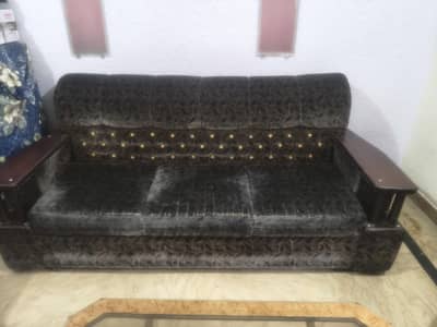 uses sofa set with table and  cushions