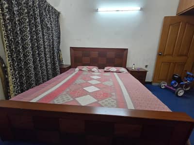 premuim wooden king size bed with same site tables and mattress