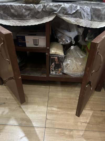 Wooden table + cupboard available for sale