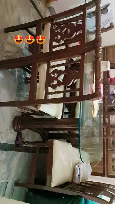 8 chairs pure wooden dining table with top mirror.