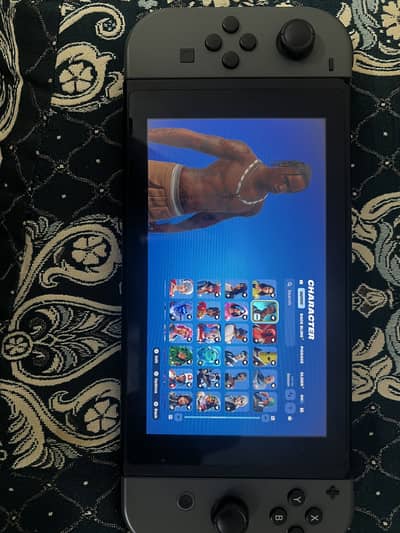 Nintendo Switch 128 Gb with travis scott skin