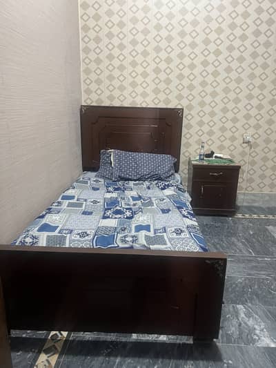 Wooden single 2 beds