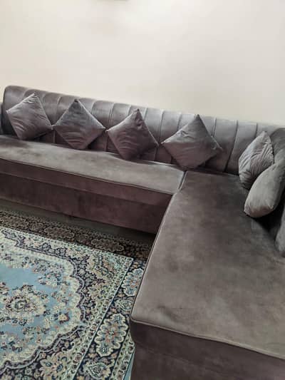 L shaped slightly used sofa for sale