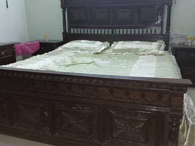 Brown wooden bed set