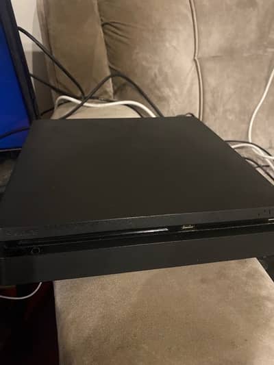 ps4 slim 5 months old