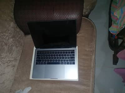 Macbook with 10/10 condition and original charger and exchange