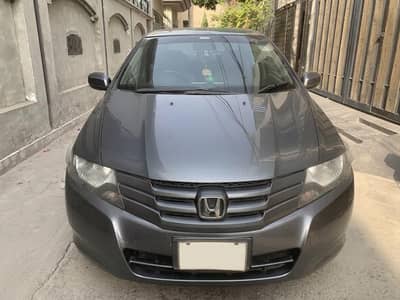 Honda City 2013 (1.3 Prosmetic Full Option]