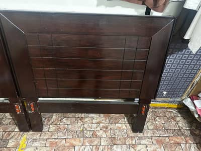 single wooden bed