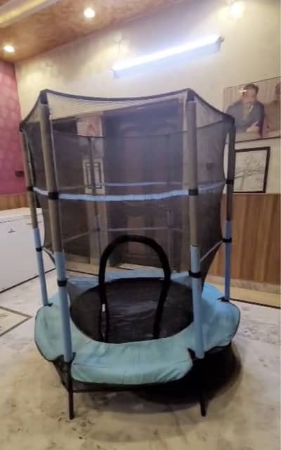 Trampoline For sale Almost New With safety