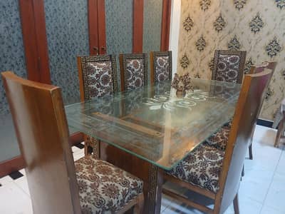 8 seater dining with flower design.  5mm top quality table glass.