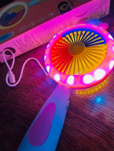 brand newi rechargeable mini hand fan withn neon pink light