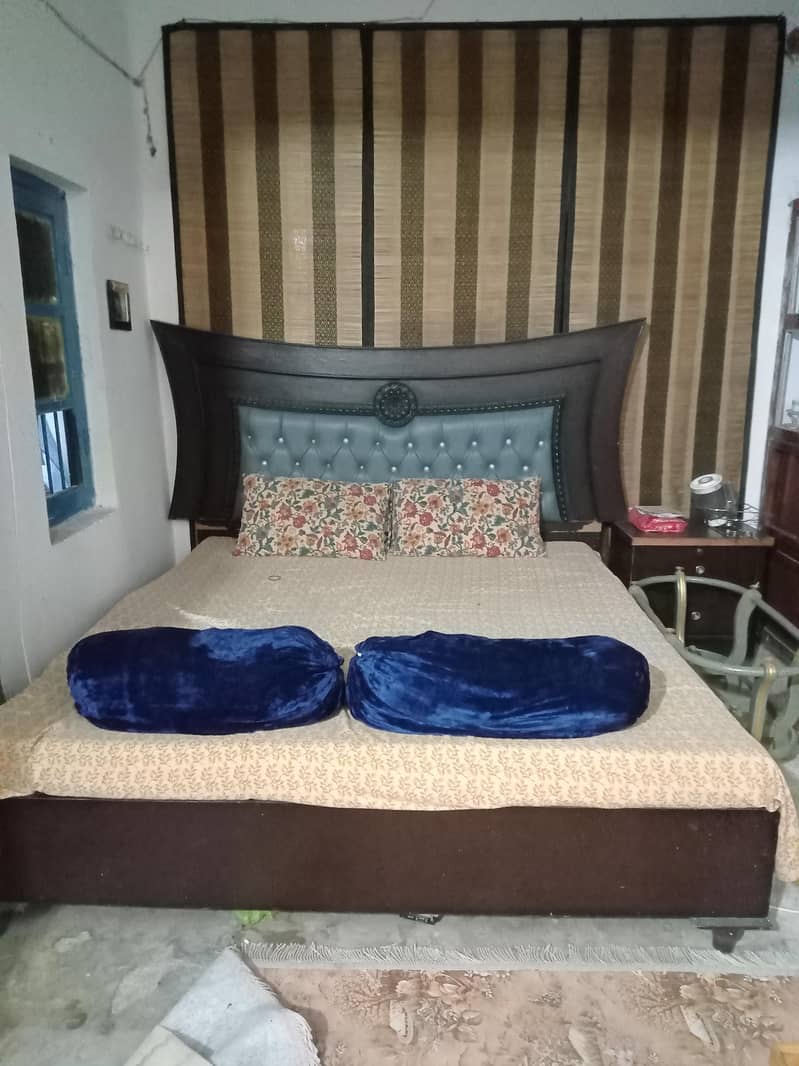 Bed 2 side table. . without mattress 0