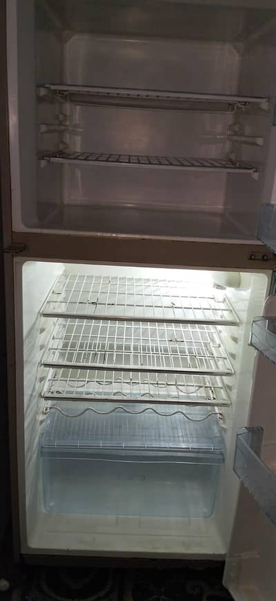 Haier fridge with two doors in good condition