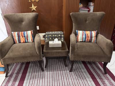 2 sofa chairs with centre table/ high back chairs