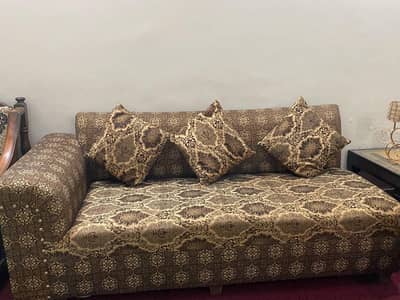 Brown L shaped 7 seater including sofa  Stool.