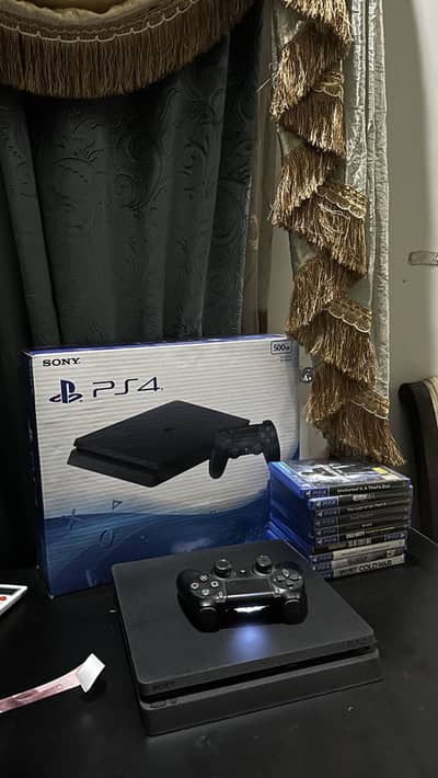 PS4 slim 500Gb with games ( Read add)
